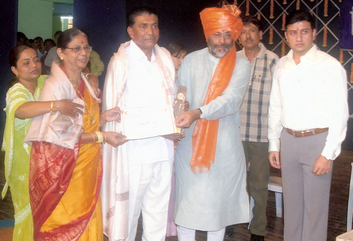 Mr. and Mrs. Hemant Girme with Swami Ramdev