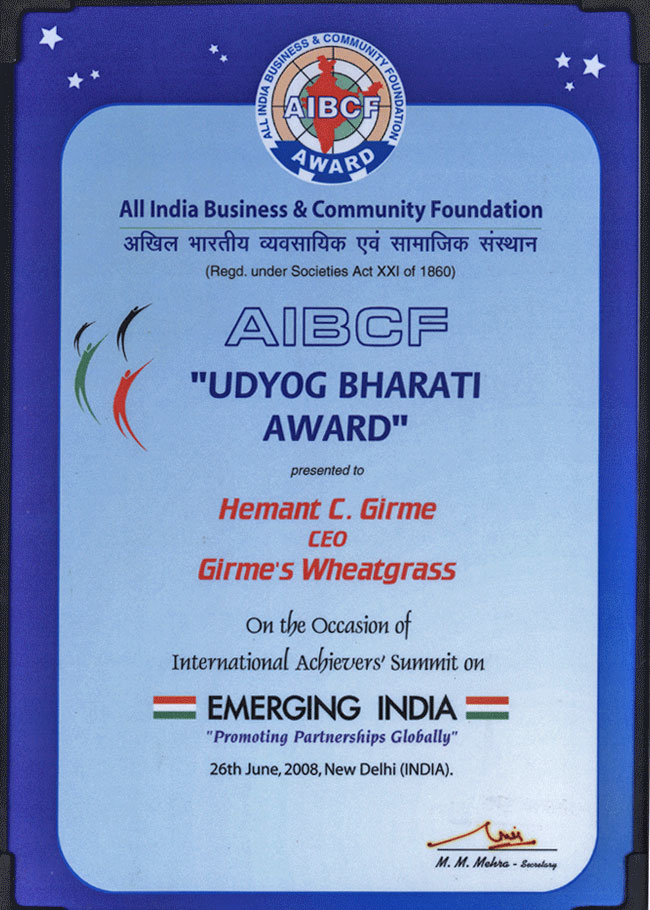 Mr. and Mrs. Hemant Girme with Acharya Balkrishna